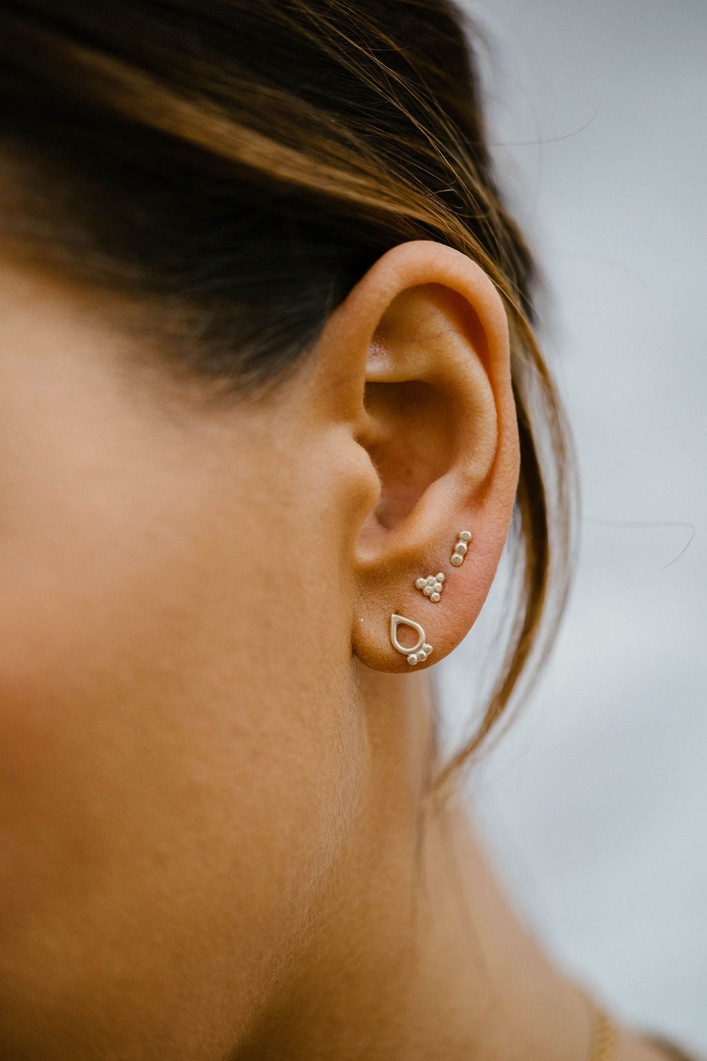 Tiniest hot sale stud earrings